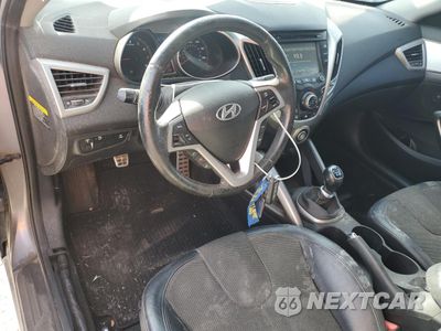 Zdjęcie 8 z 12 samochodu: 2012 HYUNDAI VELOSTER VIN:KMHTC6AD0CU077629 - miniatura