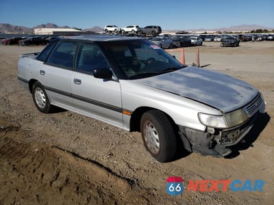 Czwarte zdjęcie samochodu z boku: 1993 SUBARU LEGACY L VIN:4S3BC6333P9654859 - miniatura