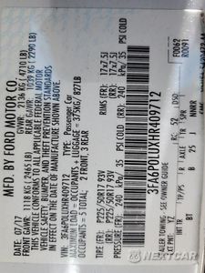 Zdjęcie 12 z 13 samochodu: 2017 FORD FUSION SE HYBRID VIN:3FA6P0LUXHR409712 - miniatura