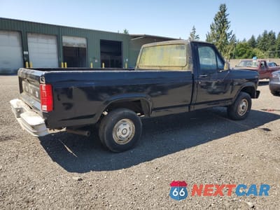 Trzecie zdjęcie samochodu z tyłu: 1985 FORD F150 VIN:1FTEF14YXFPB36520 - miniatura