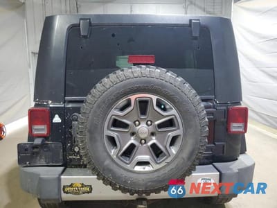Zdjęcie 6 z 12 samochodu: 2008 JEEP WRANGLER UNLIMITED SAHARA VIN:1J8GA59168L553341 - miniatura