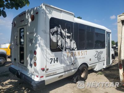 Trzecie zdjęcie samochodu z tyłu: 2016 FORD ECONOLINE - TRANSIT VEHICLES SHUTTLE BUS VIN:1FDFE4FS7GDC17278 - miniatura
