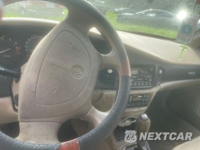 Zdjęcie 9 z 10 samochodu: 2002 BUICK REGAL LS VIN:2G4WB55K821143258 - miniatura