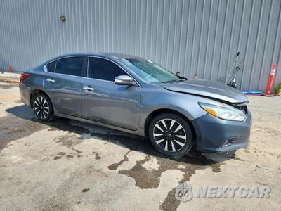 Czwarte zdjęcie samochodu z boku: 2018 NISSAN ALTIMA 2.5 VIN:1N4AL3AP3JC170528 - miniatura