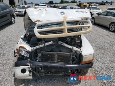 Piąte zdjęcie samochodu w środku: 2000 DODGE DAKOTA VIN:1B7GG22N2YS567745 - miniatura