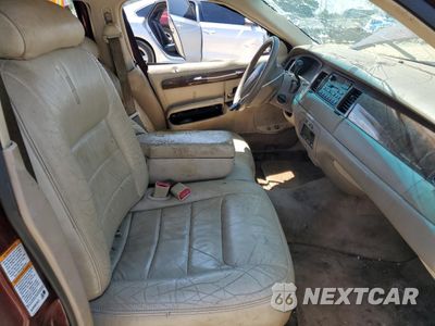 Zdjęcie 7 z 11 samochodu: 2000 LINCOLN TOWN CAR EXECUTIVE VIN:1LNHM81W6YY774724 - miniatura