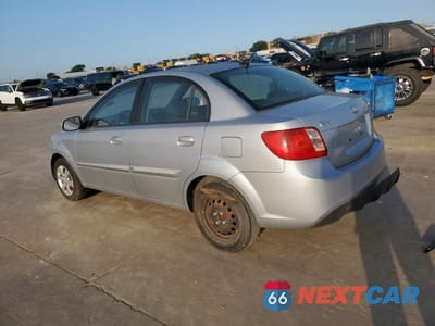 Drugie zdjęcie samochodu z przodu: 2010 KIA RIO LX VIN:KNADH4A3XA6673089 - miniatura