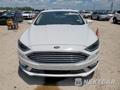 Piąte zdjęcie samochodu w środku: 2017 FORD FUSION SE HYBRID VIN:3FA6P0LUXHR409032 - miniatura