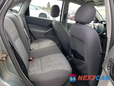 Zdjęcie 10 z 13 samochodu: 2005 FORD FOCUS ZX4 VIN:1FAFP34N55W123056 - miniatura