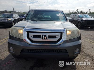 Piąte zdjęcie samochodu w środku: 2011 HONDA PILOT EXL VIN:5FNYF4H58BB046365 - miniatura