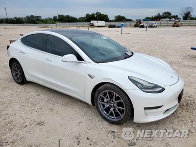 Czwarte zdjęcie samochodu z boku: 2019 TESLA MODEL 3 VIN:5YJ3E1EB0KF388334 - miniatura