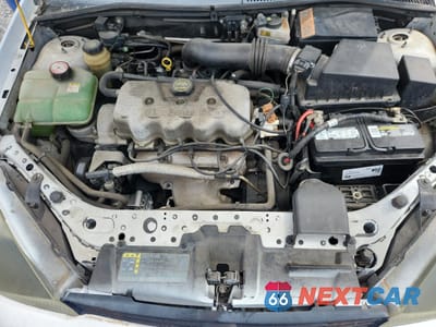 Zdjęcie 11 z 14 samochodu: 2004 FORD FOCUS LX VIN:1FAFP33P84W191529 - miniatura
