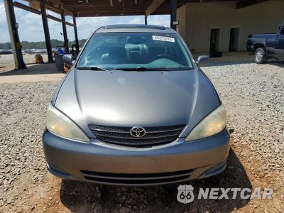 Piąte zdjęcie samochodu w środku: 2002 TOYOTA CAMRY LE VIN:4T1BF30K72U513151 - miniatura