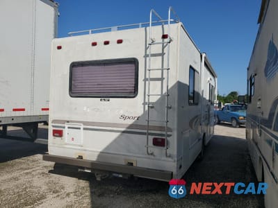Czwarte zdjęcie samochodu z boku: 2002 FORD ECONOLINE E450 SUPER DUTY CUTAWAY VAN VIN:1FDXE45S22HB06225 - miniatura
