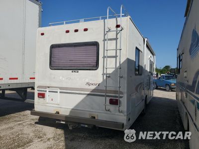 Czwarte zdjęcie samochodu z boku: 2002 FORD ECONOLINE E450 SUPER DUTY CUTAWAY VAN VIN:1FDXE45S22HB06225 - miniatura