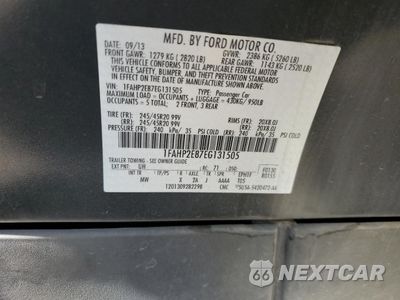 Zdjęcie 12 z 12 samochodu: 2014 FORD TAURUS SEL VIN:1FAHP2E87EG131505 - miniatura