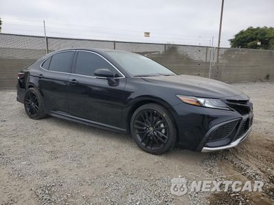 Czwarte zdjęcie samochodu z boku: 2023 TOYOTA CAMRY XSE VIN:4T1K31AK3PU056261 - miniatura