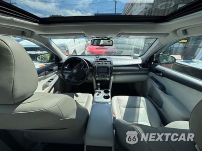 Zdjęcie 7 z 11 samochodu: 2012 TOYOTA CAMRY HYBRID VIN:4T1BD1FKXCU017649 - miniatura
