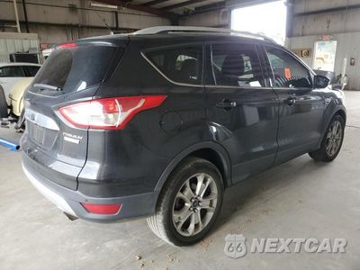 Trzecie zdjęcie samochodu z tyłu: 2015 FORD ESCAPE TITANIUM VIN:1FMCU0JX7FUA24239 - miniatura