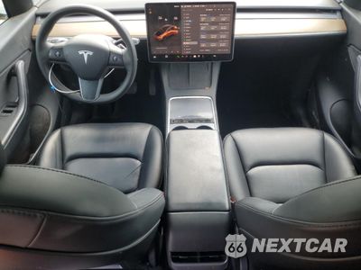 Zdjęcie 8 z 14 samochodu: 2022 TESLA MODEL Y VIN:7SAYGDEE3NF440185 - miniatura