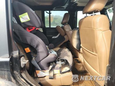 Zdjęcie 10 z 13 samochodu: 2011 JEEP WRANGLER UNLIMITED SAHARA VIN:1J4HA5H11BL519483 - miniatura