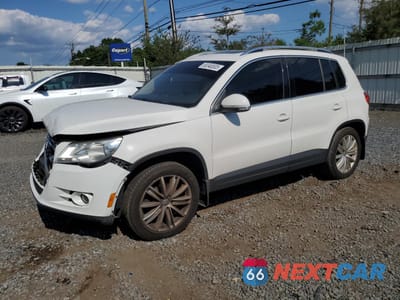 2009 VOLKSWAGEN TIGUAN S WVGAV75N29W526882 - główne zdjęcie licytacji z USA - miniatura