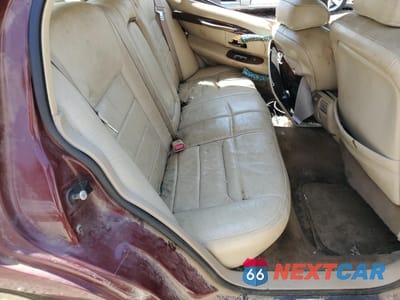 Zdjęcie 10 z 11 samochodu: 2000 LINCOLN TOWN CAR EXECUTIVE VIN:1LNHM81W6YY774724 - miniatura