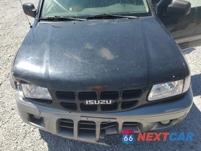 Zdjęcie 12 z 15 samochodu: 2002 ISUZU RODEO S VIN:4S2DM58W324340853 - miniatura