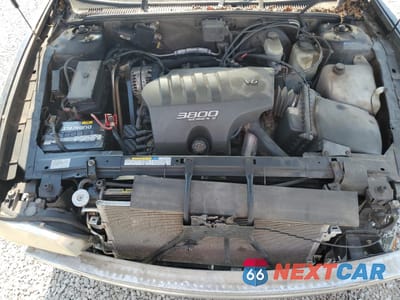 Zdjęcie 11 z 15 samochodu: 2000 BUICK PARK AVENUE VIN:1G4CW54K3Y4266343 - miniatura