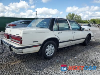 Trzecie zdjęcie samochodu z tyłu: 1991 BUICK LESABRE CUSTOM VIN:1G4HP54C6MH453249 - miniatura