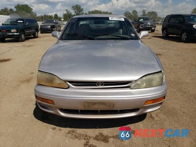 Piąte zdjęcie samochodu w środku: 1996 TOYOTA CAMRY DX VIN:JT2BG12K3T0418235 - miniatura