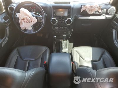 Zdjęcie 8 z 13 samochodu: 2017 JEEP WRANGLER UNLIMITED SAHARA VIN:1C4BJWEG8HL533965 - miniatura