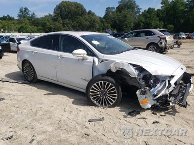 Czwarte zdjęcie samochodu z boku: 2017 FORD FUSION TITANIUM HEV VIN:3FA6P0RU7HR232575 - miniatura