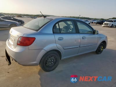 Trzecie zdjęcie samochodu z tyłu: 2010 KIA RIO LX VIN:KNADH4A3XA6673089 - miniatura
