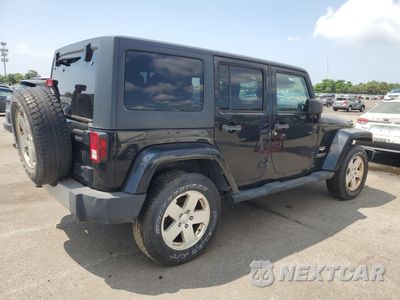 Trzecie zdjęcie samochodu z tyłu: 2011 JEEP WRANGLER UNLIMITED SAHARA VIN:1J4HA5H19BL633246 - miniatura