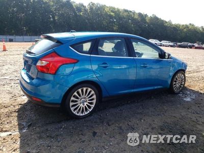 Trzecie zdjęcie samochodu z tyłu: 2012 FORD FOCUS TITA VIN:1FAHP3N25CL230197 - miniatura