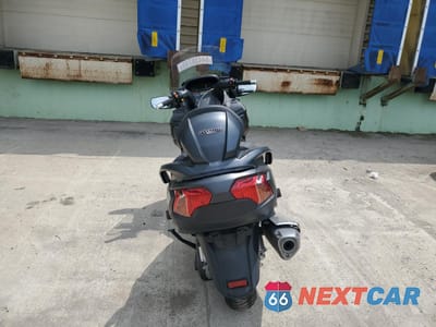 Czwarte zdjęcie samochodu z boku: 2016 SUZUKI AN650 A VIN:JS1CP51B0G2100128 - miniatura