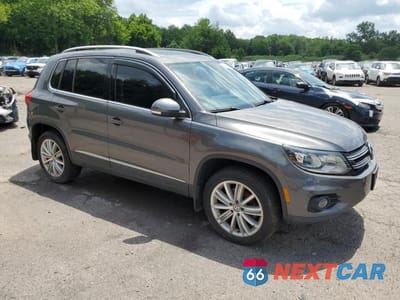 Czwarte zdjęcie samochodu z boku: 2016 VOLKSWAGEN TIGUAN S VIN:WVGBV7AX5GW564549 - miniatura