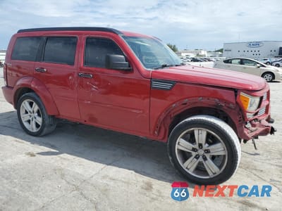 Czwarte zdjęcie samochodu z boku: 2011 DODGE NITRO HEAT VIN:1D4PU4GK9BW576870 - miniatura