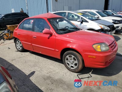 Czwarte zdjęcie samochodu z boku: 2003 HYUNDAI ACCENT GL VIN:KMHCG45C23U458165 - miniatura