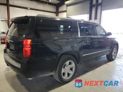 Trzecie zdjęcie samochodu z tyłu: 2017 CHEVROLET SUBURBAN K1500 LT VIN:1GNSKHKC6HR242220 - miniatura