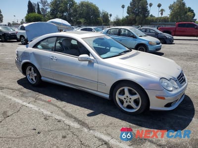 Czwarte zdjęcie samochodu z boku: 2003 MERCEDES-BENZ CLK 500 VIN:WDBTJ75J13F041726 - miniatura