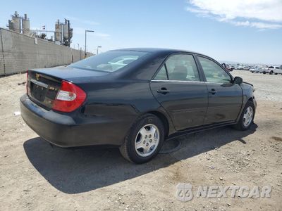Trzecie zdjęcie samochodu z tyłu: 2002 TOYOTA CAMRY LE VIN:4T1BF32K22U523065 - miniatura