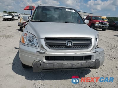 Piąte zdjęcie samochodu w środku: 2004 HONDA PILOT EX VIN:2HKYF18434H541437 - miniatura