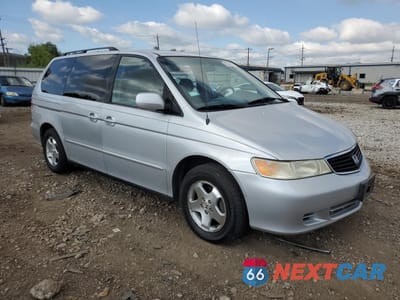 Czwarte zdjęcie samochodu z boku: 2001 HONDA ODYSSEY EX VIN:2HKRL18661H601091 - miniatura