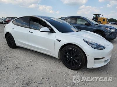 Czwarte zdjęcie samochodu z boku: 2021 TESLA MODEL 3 VIN:5YJ3E1EB0MF849938 - miniatura