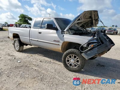 Czwarte zdjęcie samochodu z boku: 1999 DODGE RAM 2500 VIN:3B7KF2368XG127667 - miniatura