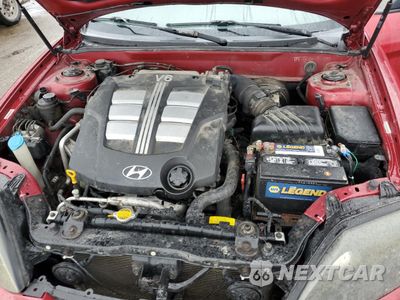 Zdjęcie 11 z 14 samochodu: 2005 HYUNDAI TIBURON GT VIN:KMHHN65F25U164141 - miniatura
