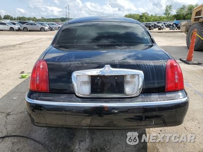 Zdjęcie 6 z 12 samochodu: 2000 LINCOLN TOWN CAR SIGNATURE VIN:1LNHM82W1YY914712 - miniatura