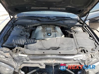 Zdjęcie 11 z 13 samochodu: 2003 BMW 745 I VIN:WBAGL63473DP62369 - miniatura